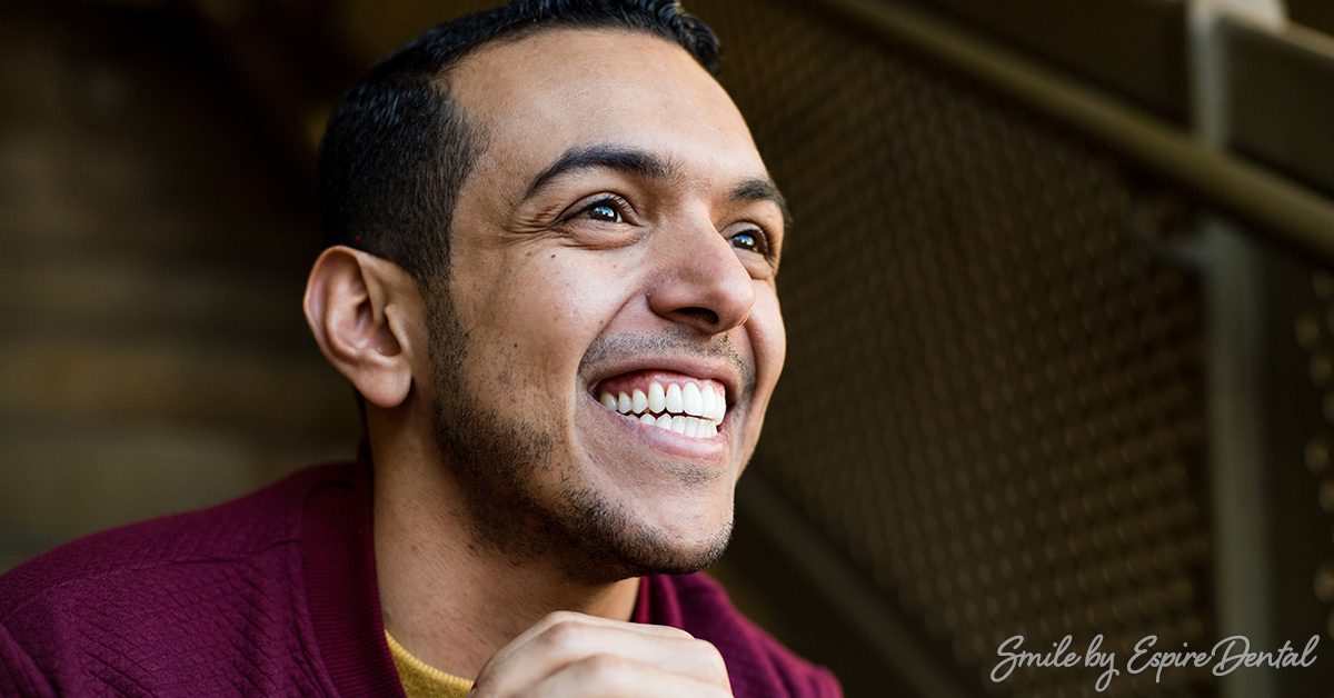 Latino man smiling with white teeth